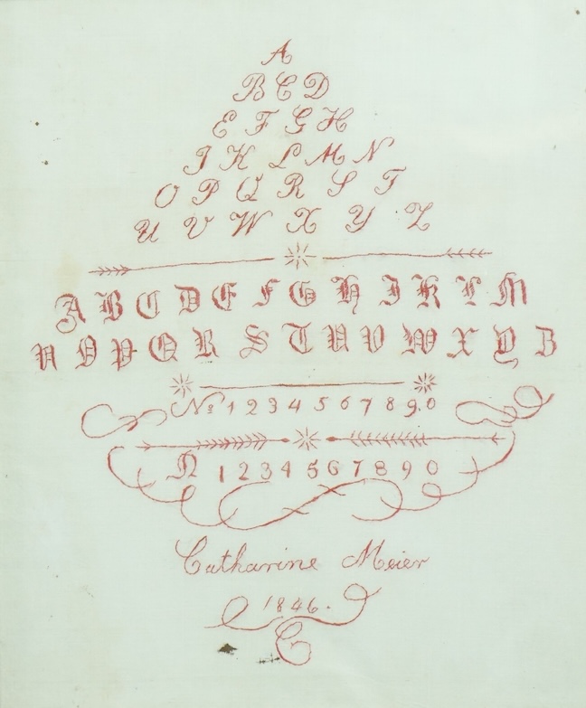 A German or Dutch very finely embroidered red silk on white linen, teardrop patterned alphabet sampler. Dated 1846 by Catharine Meier. 24cm wide x 29cm high. Condition - a few fine black ink marks and slight stains, but